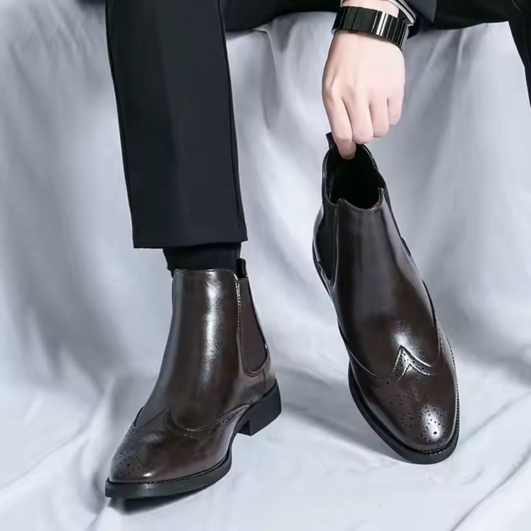 Men's black waterproof Chelsea boots slip-on style with sleek PU upper and slip-resistant rubber sole