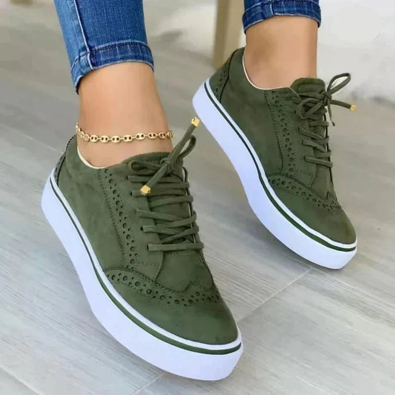 Tan suede lace-up platform sneakers with brogue punch-out detailing for women