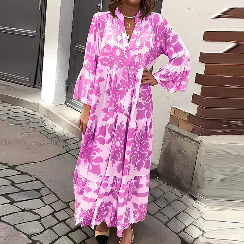 Women's boho flowy printed maxi dress in vibrant artistic patterns with draped silhouette