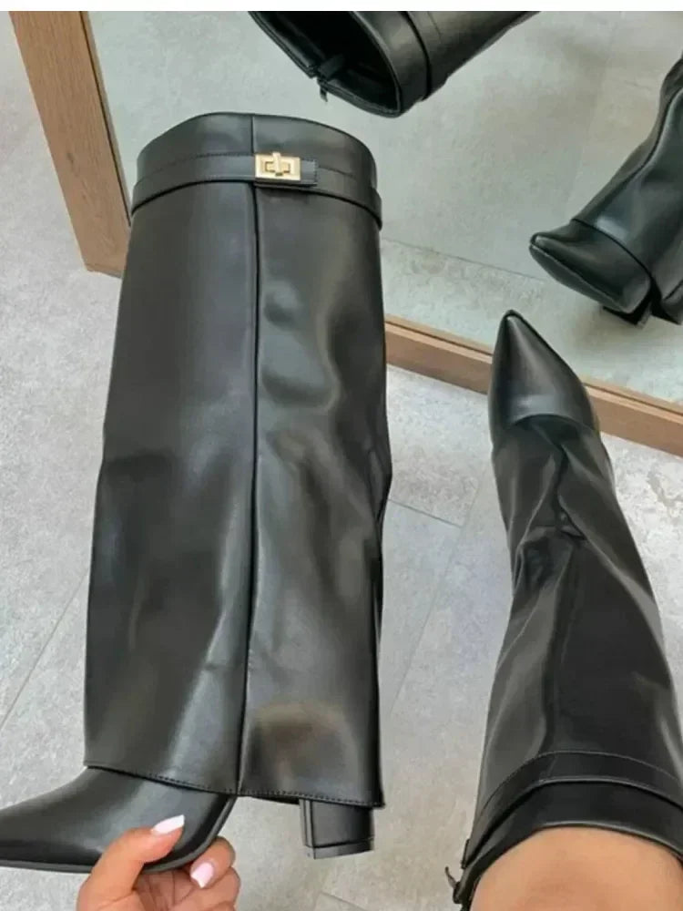 Black leather thigh-high boots with bold buckle detail, sleek sculpted silhouette for women