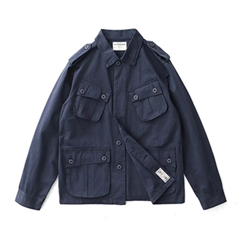 Olive green men's M43 vintage military field jacket with shoulder epaulets and rugged utility design
