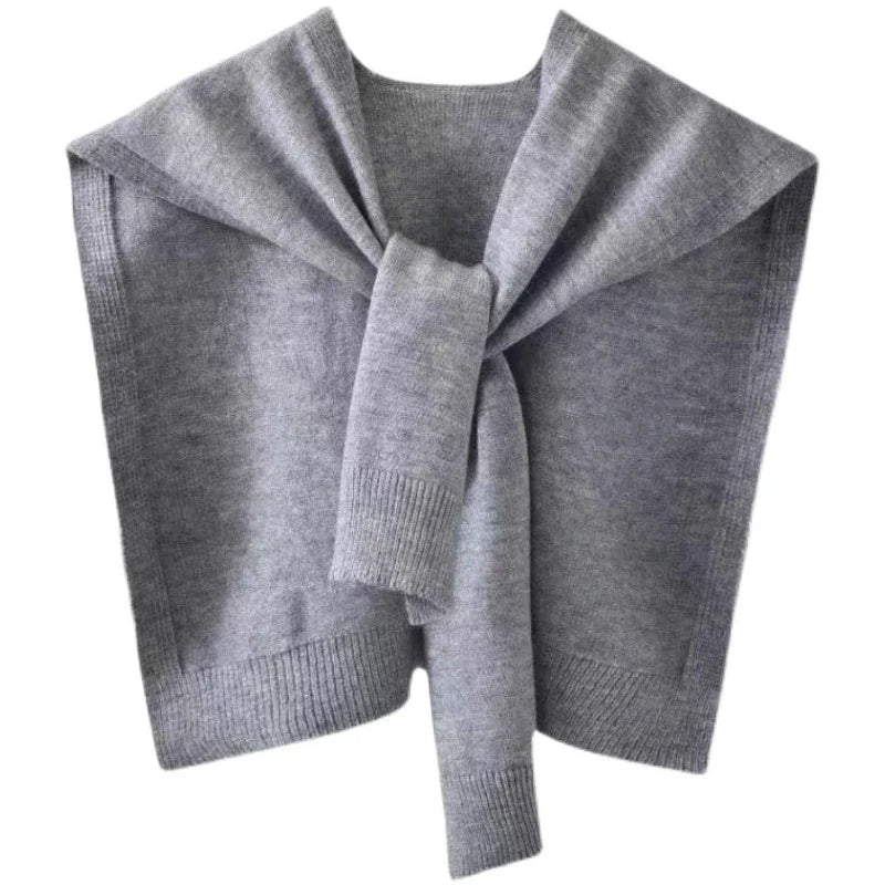 Neutral knitted scarf wrap with sweater-inspired texture, versatile rectangular silhouette for layering