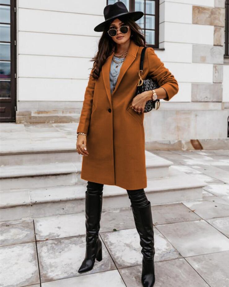 Women's double-breasted longline coat with structured silhouette and versatile layering design