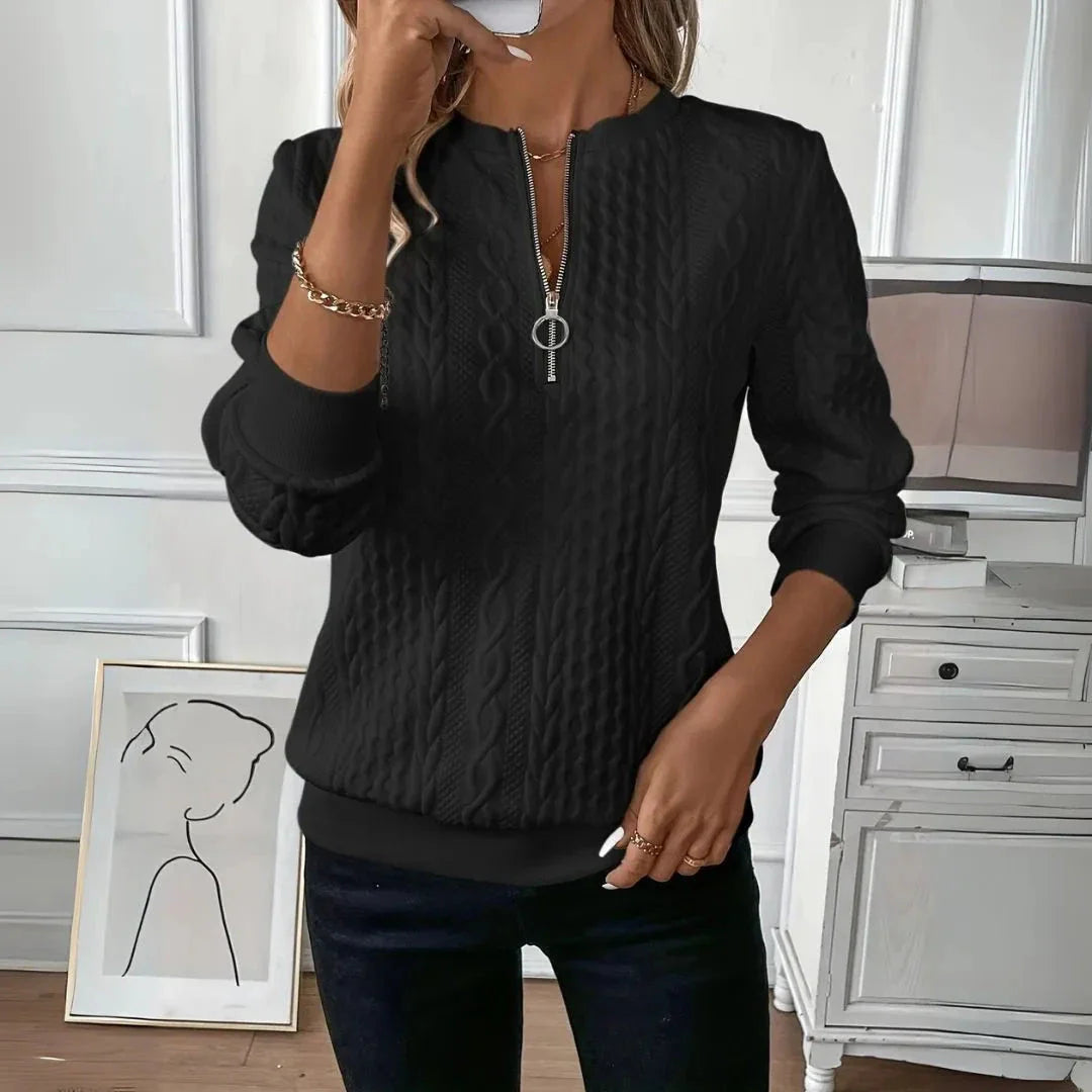 Serena cable-knit quarter-zip pullover sweater with ribbed cuffs and O-ring zipper, cozy casual style