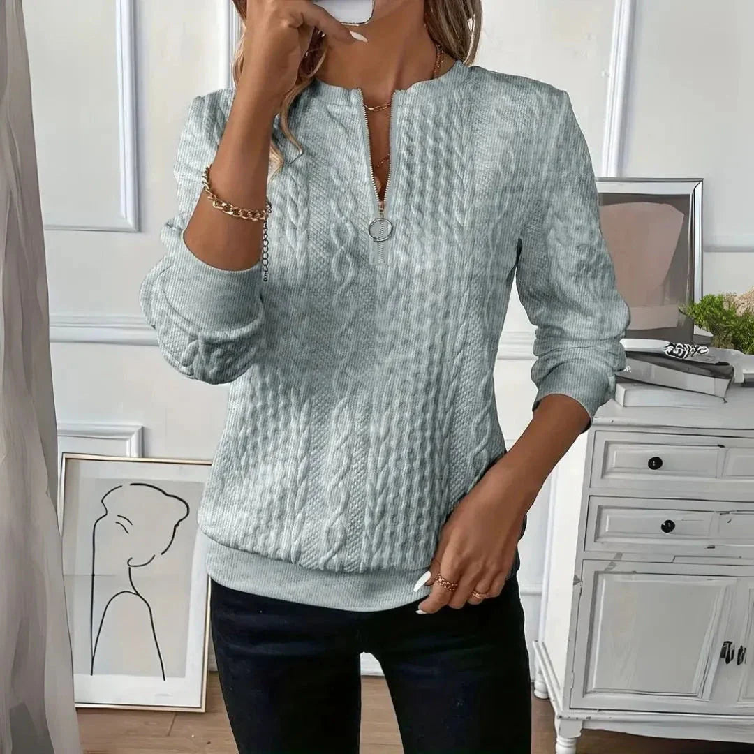 Serena cable-knit quarter-zip pullover sweater with O-ring zipper, ribbed cuffs, cozy textured fit