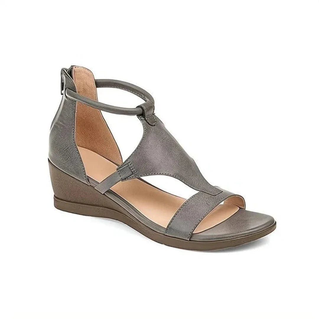 Women's beige comfort ankle strap wedge sandals with cushioned footbed and cut-out breathable design
