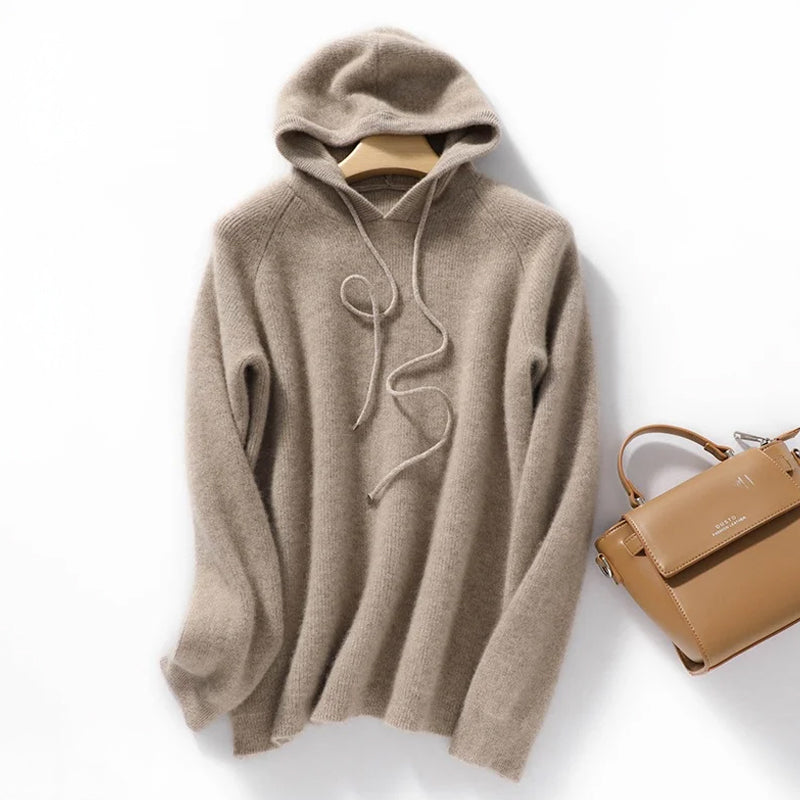Cream ribbed wool-blend relaxed hoodie with long drawstrings and soft textured knit fabric