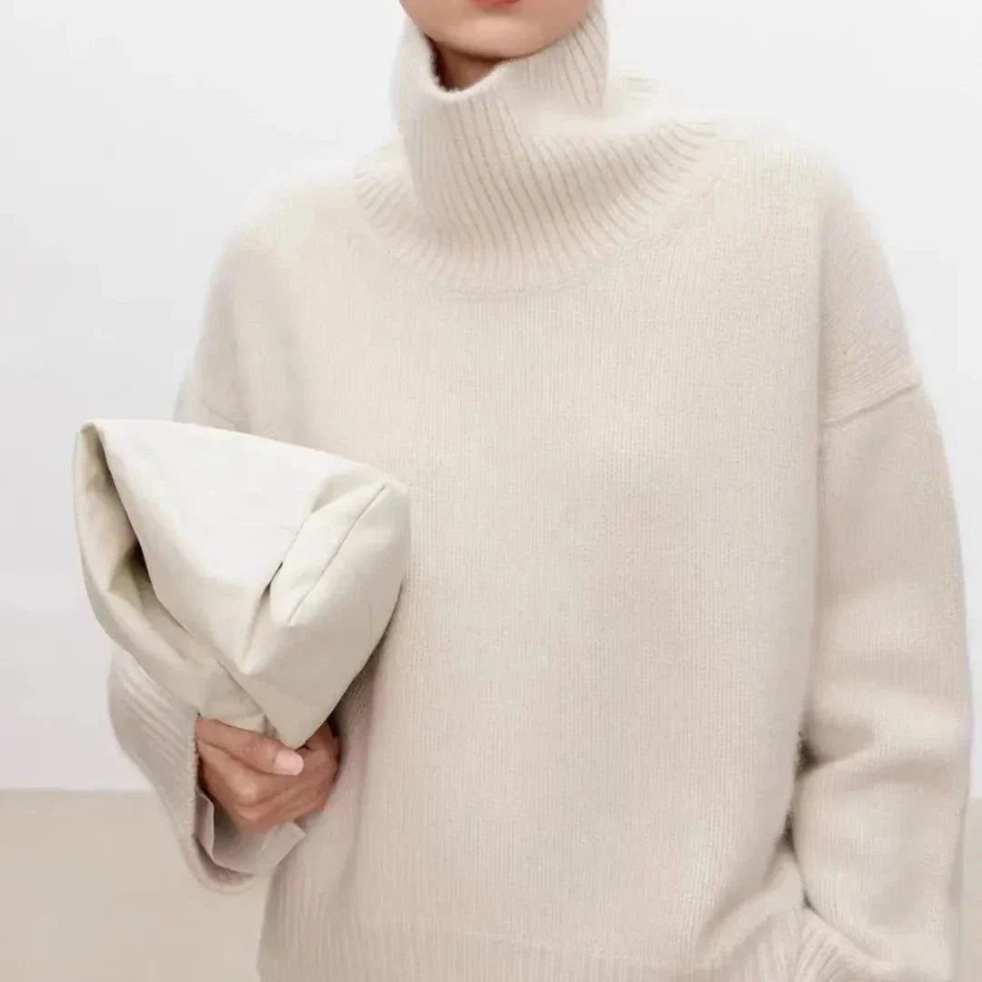 Ivory oversized cashmere high-neck sweater with relaxed fit and plush wool blend texture