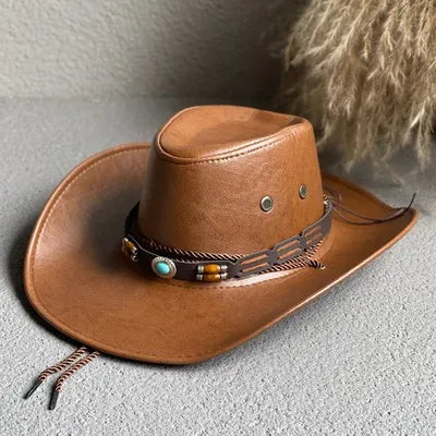 Vintage brown cowboy hat with wide brim, classic Western silhouette and rugged distressed finish