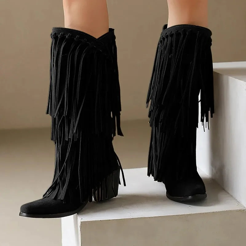 Women's brown fringe knee-high western boots with block heel and flowing fringe detailing