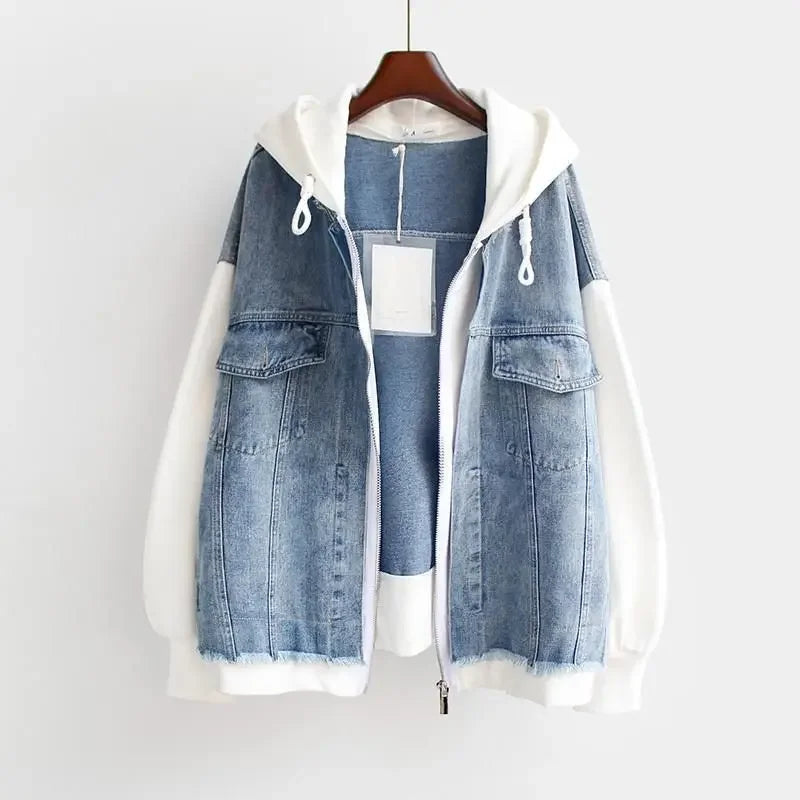 Oversized color-blocked denim hoodie with vertical panels, raw-edged hem, and vintage distressed finish