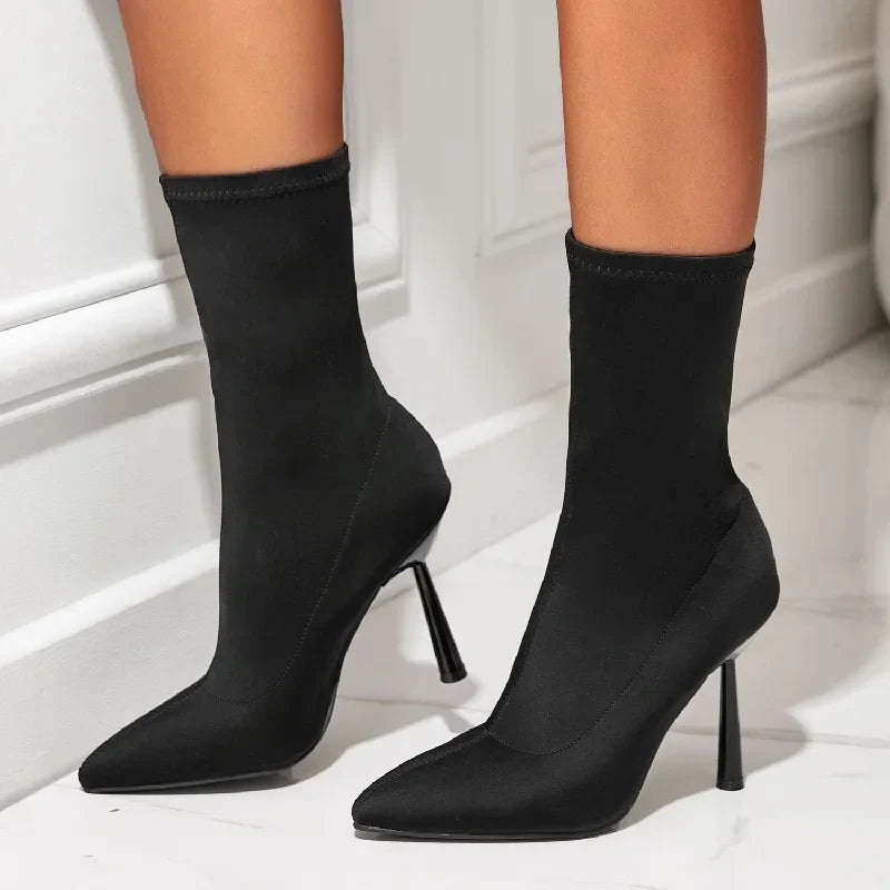 Black nylon stiletto boot with sleek sculpted silhouette and bold 8cm heel