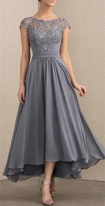 Elegant lace chiffon maxi dress in soft tones with flowing silhouette and delicate lace overlay