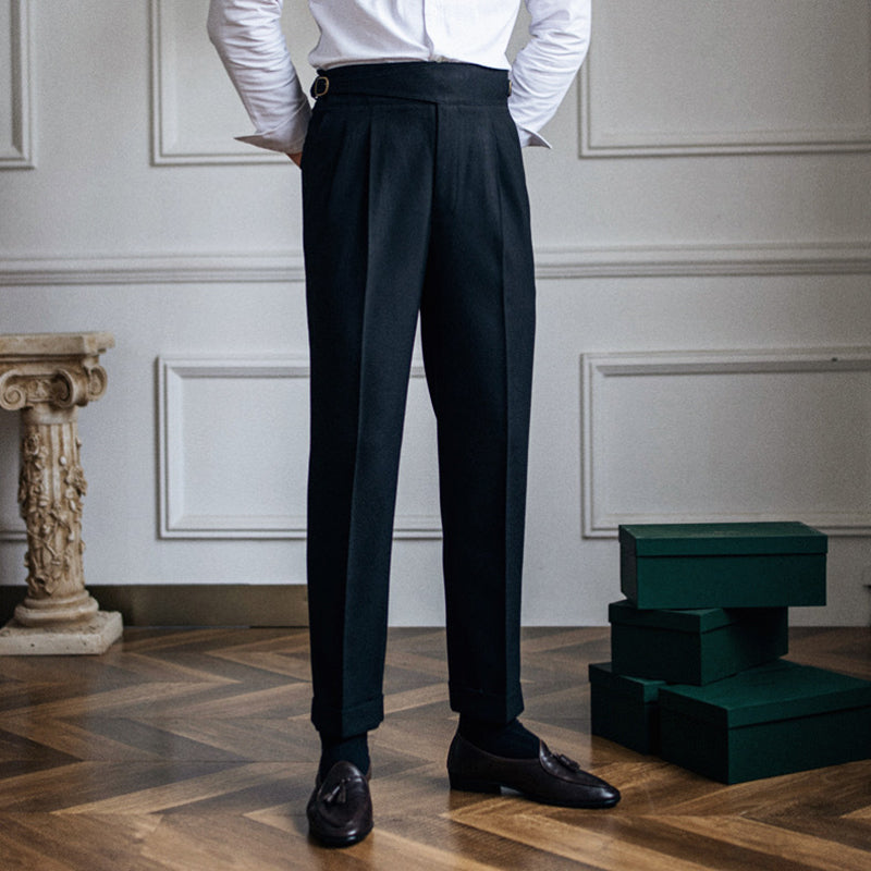 Dark wool blend high waist pleated trousers with belted detail, tailored Milano fit