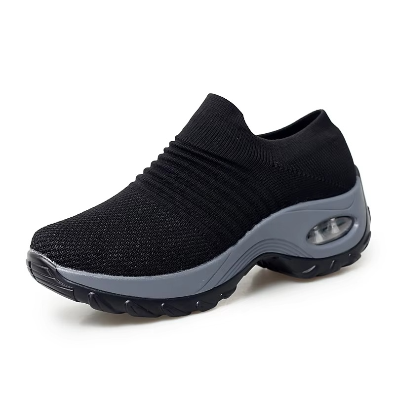 Women's black mesh platform sneakers with breathable knit upper and bold chunky sole