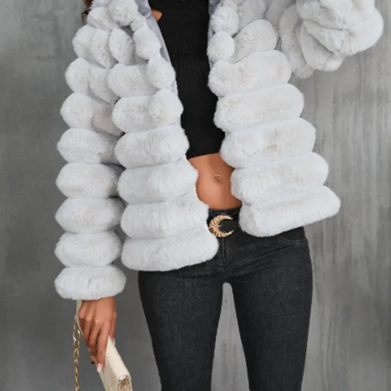 Ivory short faux fur coat with plush texture and modern silhouette for luxurious everyday wear