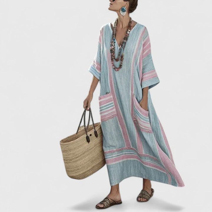 Women's mint striped linen maxi dress with V-neck, teal embroidered trim, and side pockets