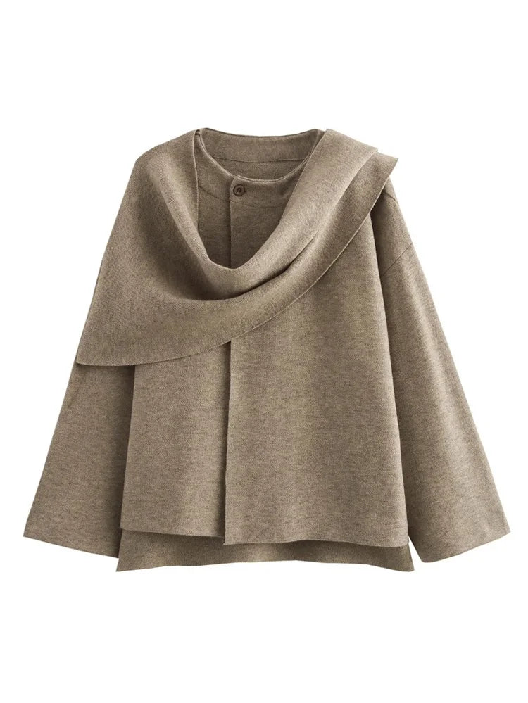 Beige knit asymmetric commuter coat with split hem detail for stylish cold-weather layering