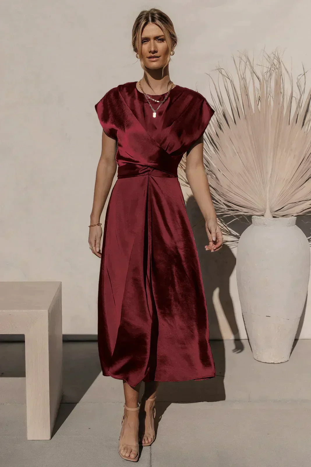 Women's satin-look midi dress in elegant A-line fit with flattering V-neck wrap design