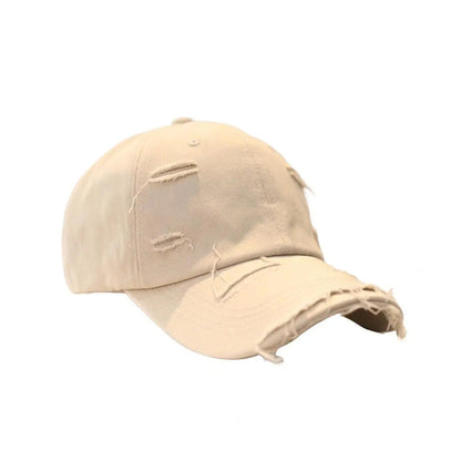 Vintage distressed cotton baseball hat with extended brim and rugged ripped detailing in multiple colors