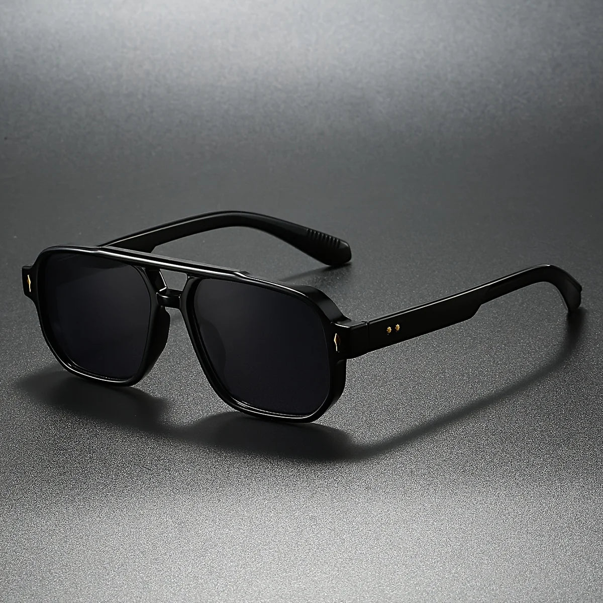 Matte black square aviator sunglasses with gold pin accents and UV400 dark-tint lenses
