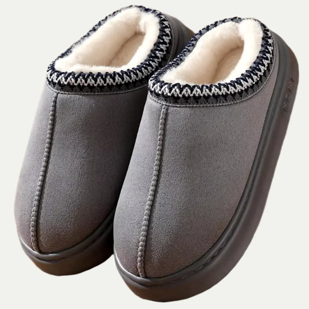 Women's faux sheepskin slippers cozy elegant silhouette available in brown black gray beige