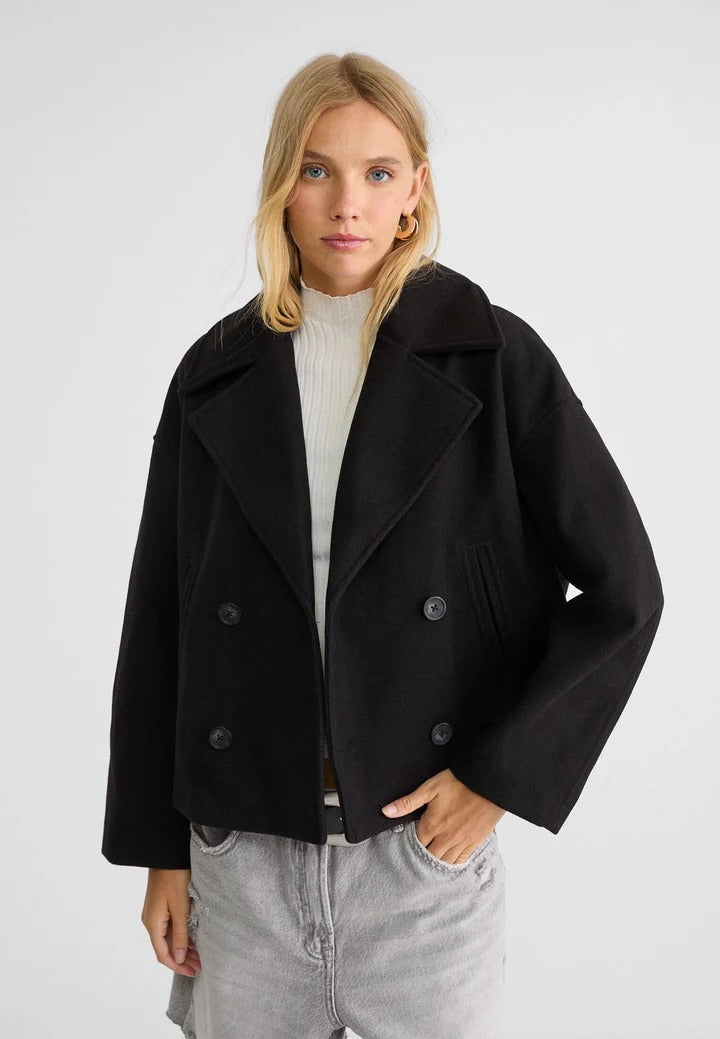 Black short double-breasted cropped jacket with classic button closure for polished everyday style