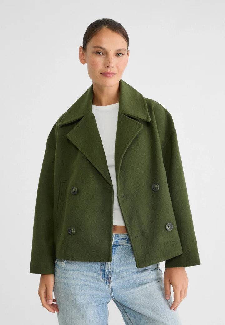 Black cropped double-breasted short jacket with classic tailored closure for versatile styling