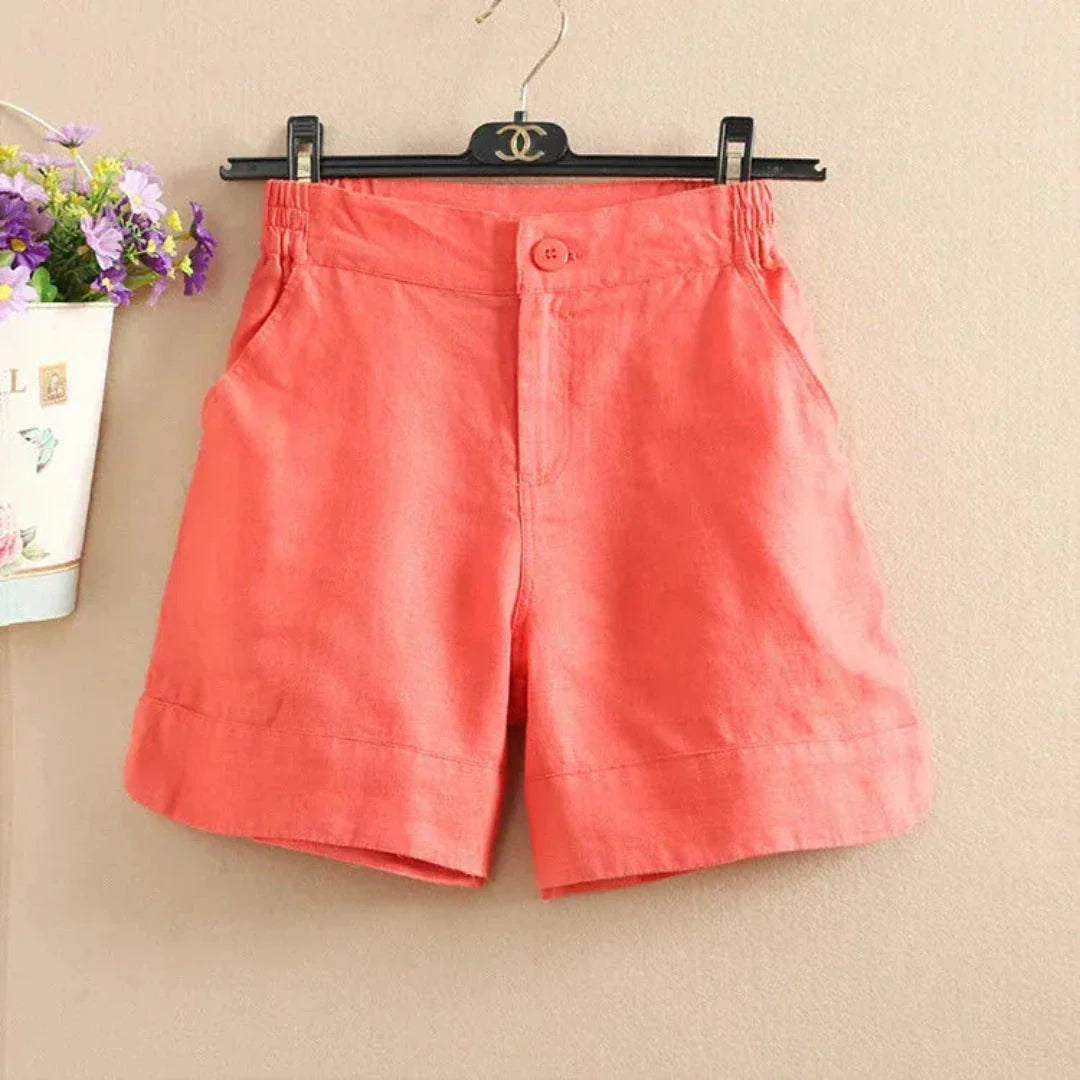 Women's relaxed-fit linen shorts with elastic waistband, breathable blend, and front button closure