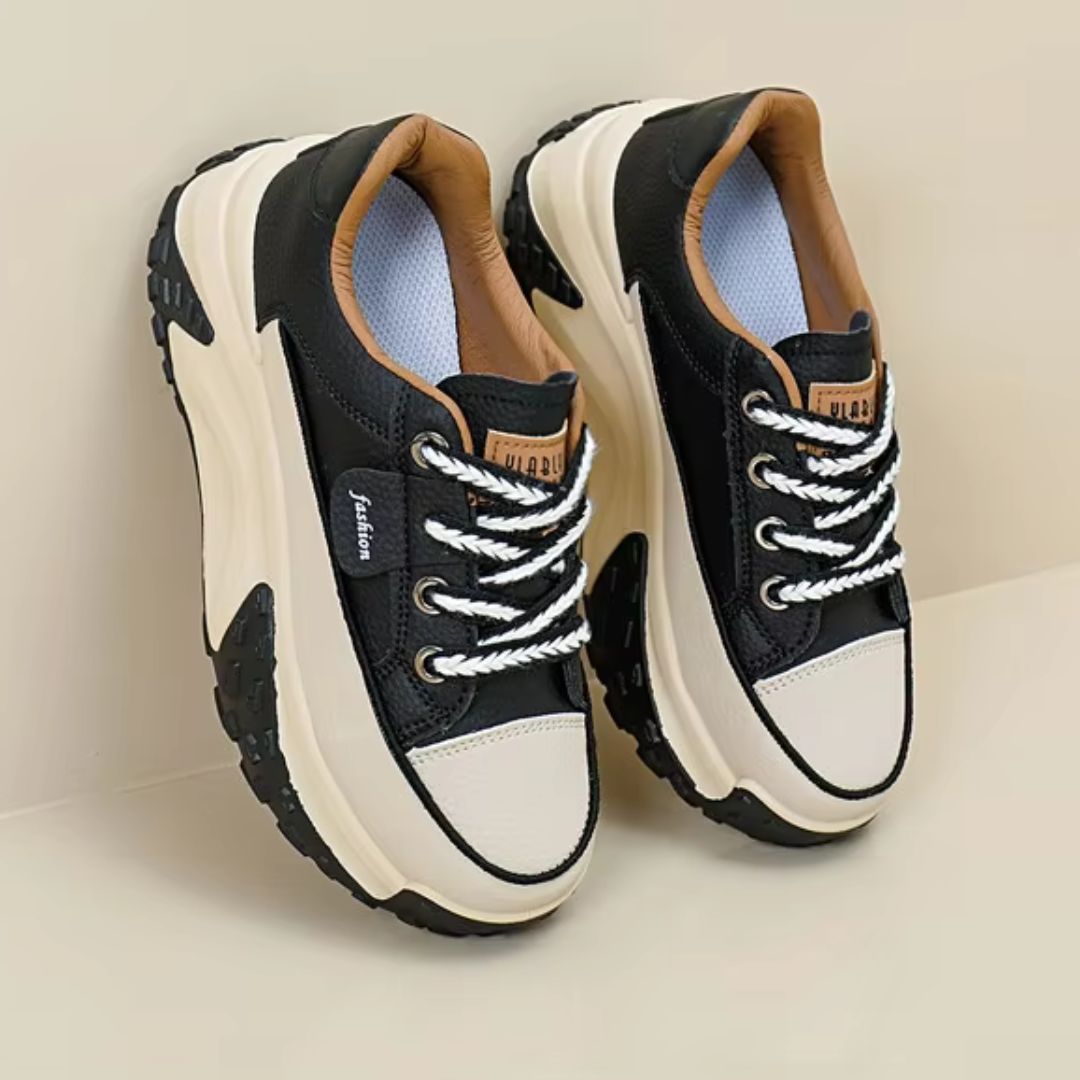 Sierra chunky platform sneakers with two-tone color design, lace-up closure, and bold rugged sole
