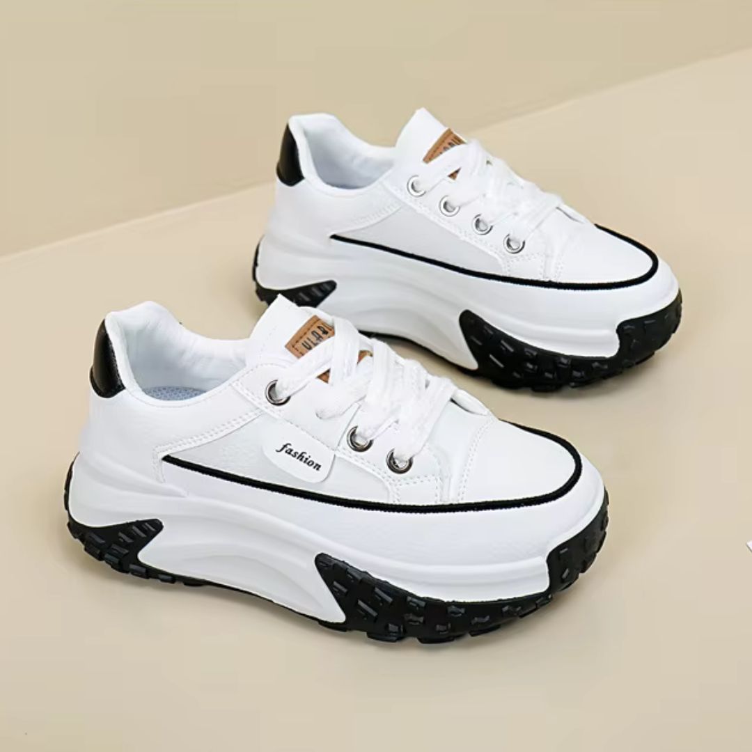 Sierra chunky platform sneakers with two-tone color design, lace-up closure, and bold rugged sole
