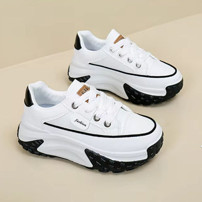 Sierra chunky platform sneakers with two-tone color design, lace-up closure, and bold rugged sole