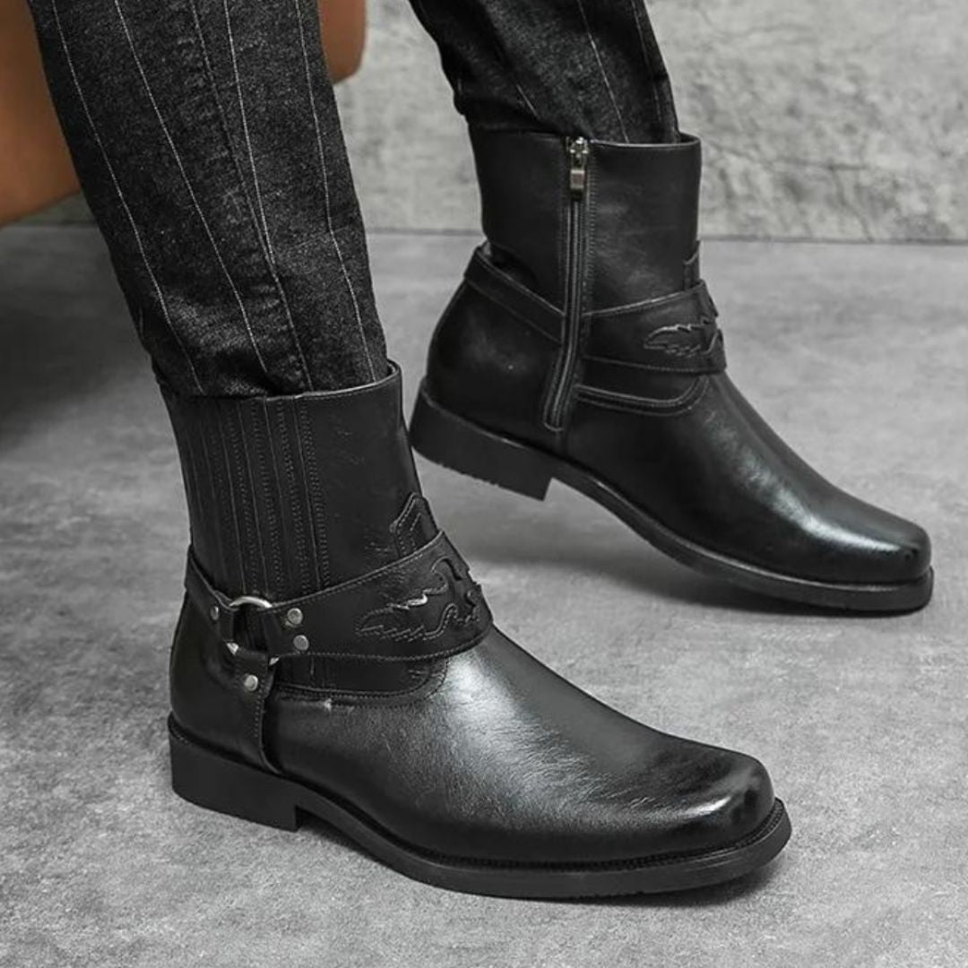 Brown faux leather Western boots with strap detail, inner zipper, and rubber outsole for street style