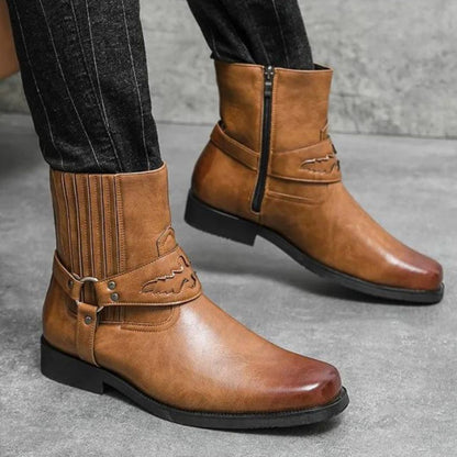 Brown faux leather Western boots with strap detail, inner side zipper, and rubber outsole