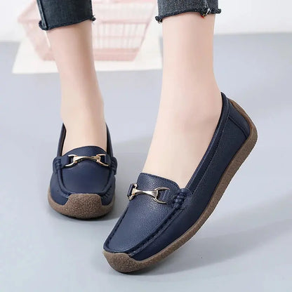 Women's slip-on moccasin flats in neutral tones, rounded toe, soft faux leather upper, everyday style