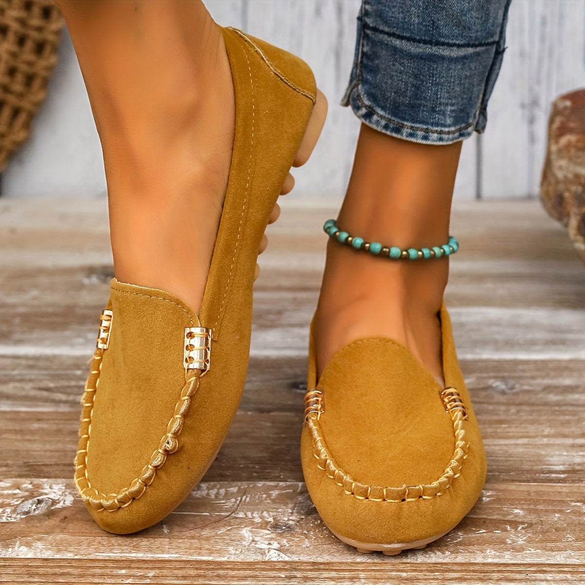 Women's slip-on moccasin loafers in smooth PU leather with casual chic silhouette and effortless comfort