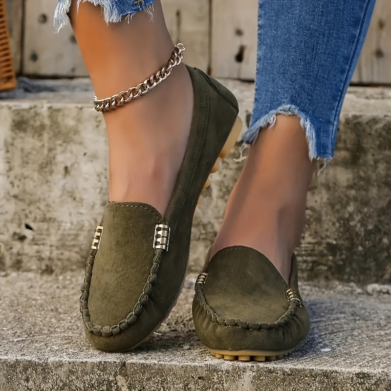Women's slip-on moccasin loafers in smooth PU leather with classic stitched toe design