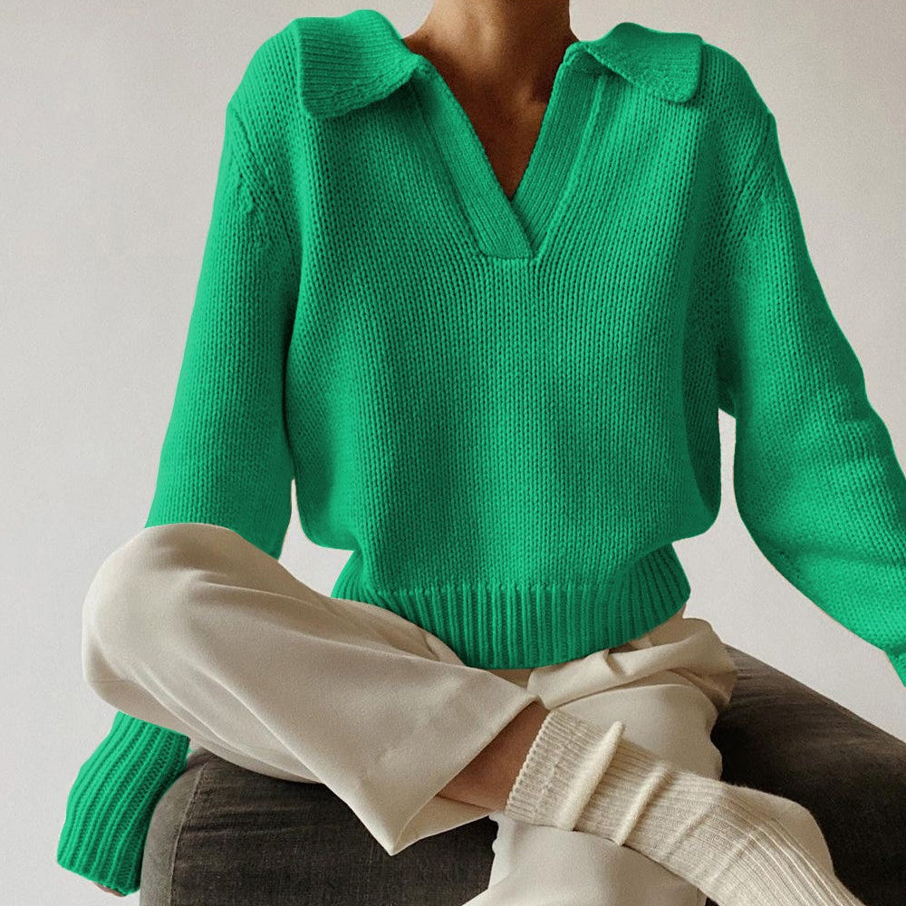 Ivory loose-fit knit sweater with bold lapel collar and irregular design, cotton-spandex blend