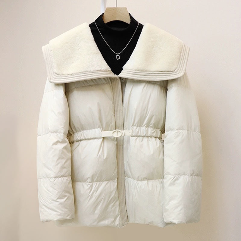 White puffer down jacket with oversized velvet collar, cinched waist belt, flattering silhouette