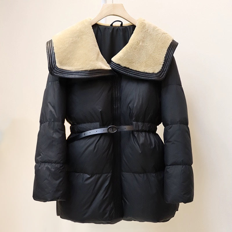 White puffer down jacket cinched waist belt oversized velvet collar Sofia Amoretti Biella elegant silhouette