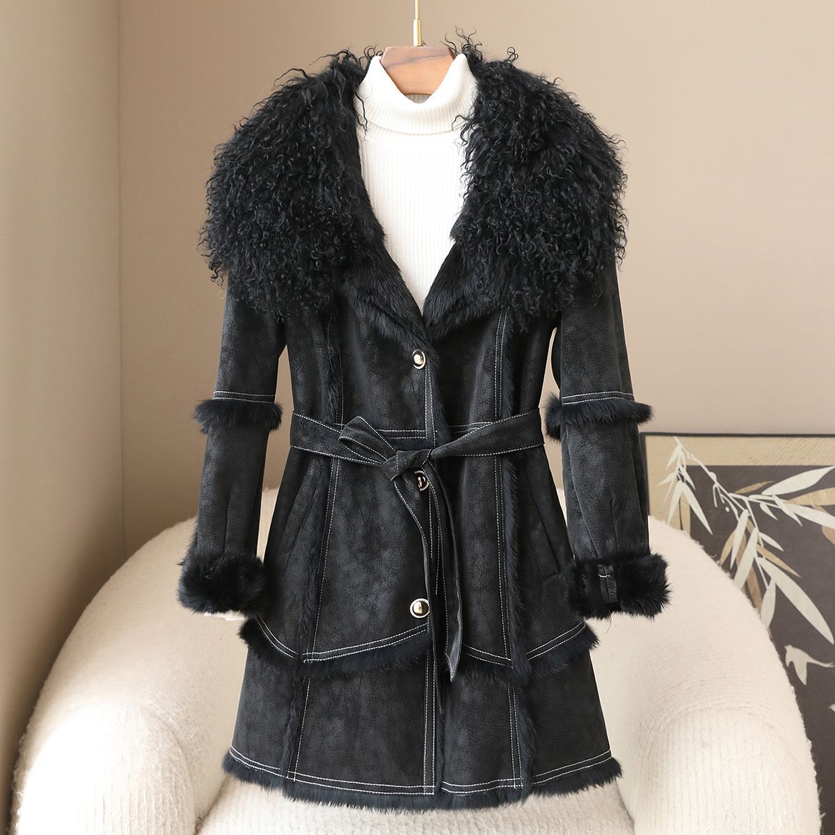 Ivory rabbit fur belted wool coat with cloud-soft texture and old-world glamour silhouette