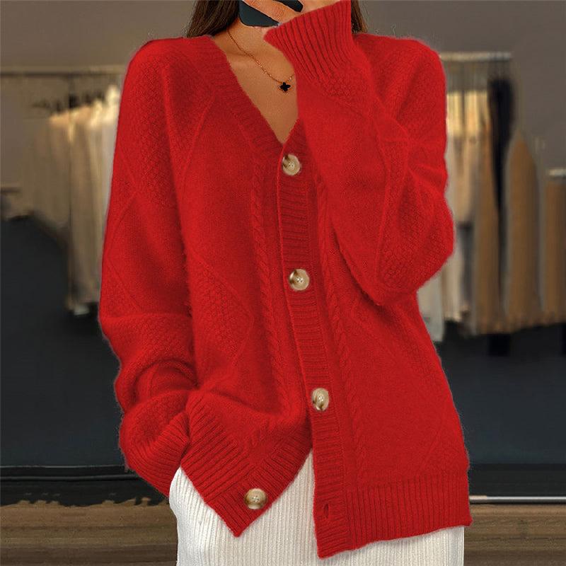 Pink cable knit cardigan relaxed fit V-neckline opalescent buttons ribbed cuffs premium wool