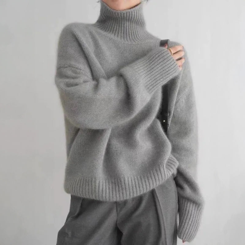 Sofia Amoretti Melfi relaxed-fit knitted pullover in neutral tone with high ribbed turtleneck and dropped shoulders