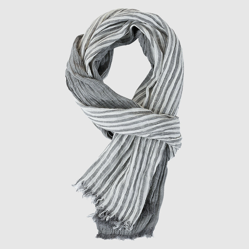 Lightweight striped viscose scarf with soft fringed hem, perfect for layering over shoulders or neck
