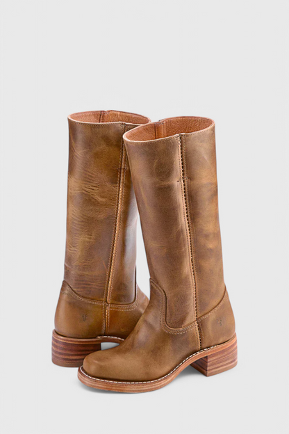 Women's black premium leather knee-high boots with sleek silhouette and refined block heel