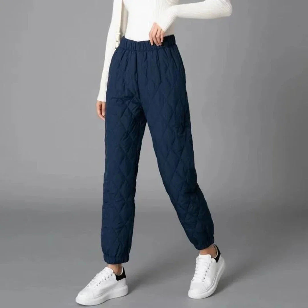 Black quilted thermal jogger pants with diamond-stitch pattern, lightweight insulation, relaxed fit
