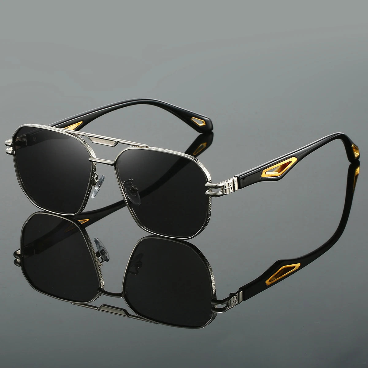 Gold metal aviator sunglasses with sculpted arms, luxury temple inlays, and UV400 lenses