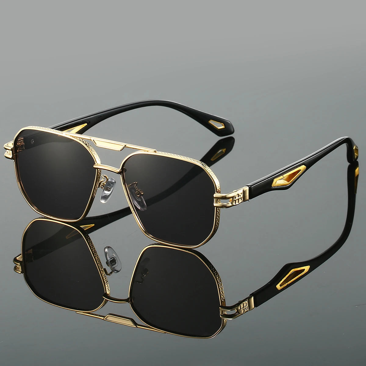 Gold metal aviator sunglasses with sculpted arms, luxury temple inlays, and UV400 lenses