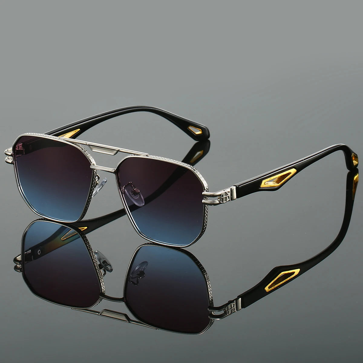 Gold metal aviator sunglasses with sculpted arms, luxury temple inlays, and UV400 lenses
