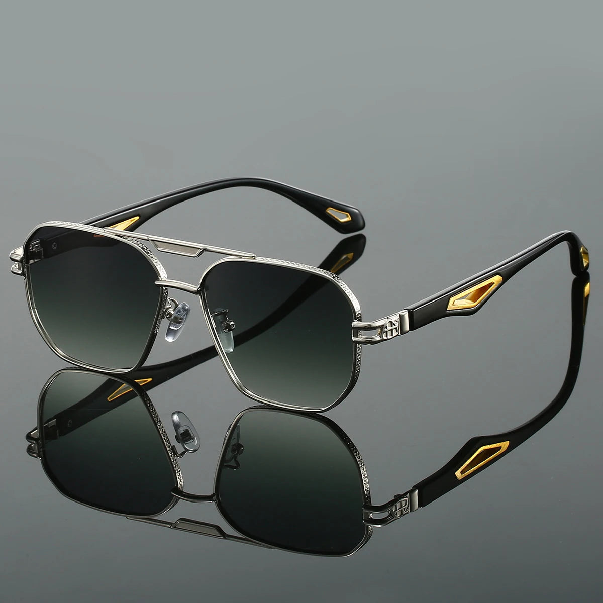 Gold metal aviator sunglasses with sculpted arms and luxury temple inlays for bold refined style